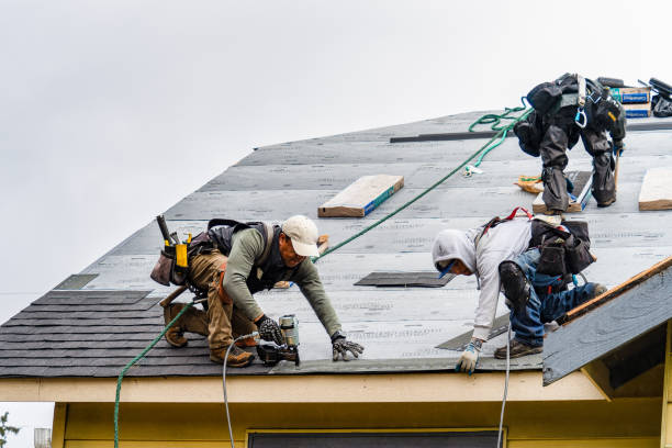 Professional Storm Damage Roof Repair technician working in Villas, NJ